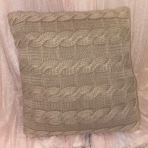 Selling a tan knit pillow